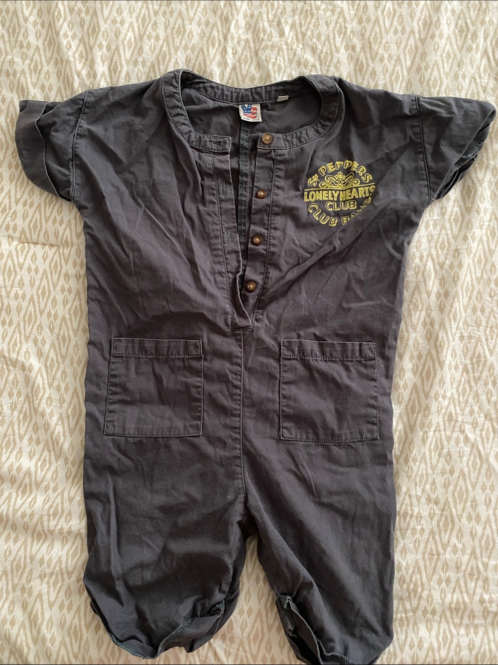 Junk Food Clothing Black Kids Romper with Yellow Chest Graphic
